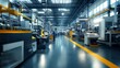 © Wayu - Modern Industrial Manufacturing Facility with Workers Operating Machinery