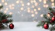 © nattapon98 - Christmas decor with pine branches and red ornaments.