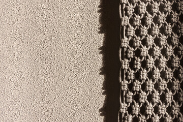 Detailed macrame texture close-up. Handmade macrame wall hanging craft design.