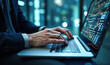 © Celt Studio - Hands typing on laptop keyboard with focus on digital data analysis, financial charts displayed on computer screen, concept of modern workplace, business strategy planning