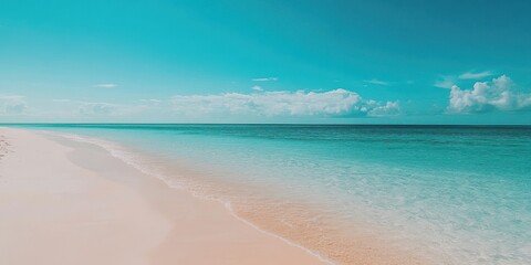 Wall Mural - tranquil beach scene with soft sand and clear turquoise water under a blue sky, perfect for relaxati