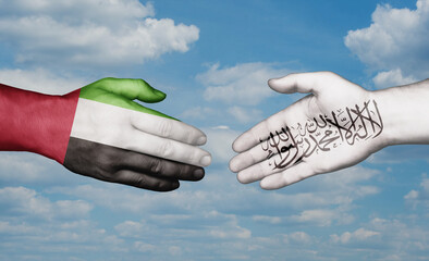 Wall Mural - United Arab Emirates and Afghanistan country handshaking with flags, consensus concept international co-operation illustration