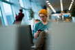 © Zhanna - Man is sitting at the airport, waiting for flight.