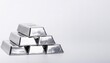 © Chase D’Animulls - Stack of silver bullion bars. The flat, rectangular shape of silver bars makes them ideal for storage in a home safe, a safe deposit box at a bank. Isolated on white background with copy space