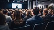 © saranya - businessmen and businesswomen in conference room, listening to the speakers which is on stage attentively