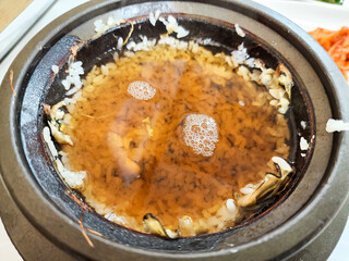 Korea food. hot pot scorched rice water