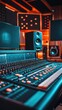 © Kitta - A close-up shot of a professional audio mixing console in a recording studio.  The console is lit by warm light, with speakers and sound panels visible in the background.