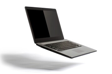 Canvas Print - A laptop computer is open and sitting on a white surface, ready for use