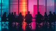 © Fauzerene - Silhouetted Professionals in a Colorful Boardroom Meeting