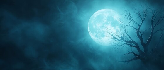 Sticker -  A solitary tree silhouetted against a full moon in a fog-enshrouded, darkness