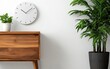 © JP STUDIO LAB - A brushed stainless steel wall clock mockup, mounted on a white wall with sleek, minimalist hands
