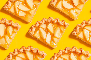 Wall Mural - apple pie slices pattern on yellow background