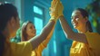 © Johannes - Team of service cleaning staff, home and office cleaners, giving high five with smile. Unity and teamwork during housecleaning, exchanging high five. copy space for text.