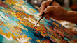 © EmmaStock - A Tibetan artist painting a thangka, with vibrant colors and intricate details coming to life on the canvas