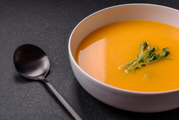 Cream soup of pumpkin, zucchini and carrots with salt and spices