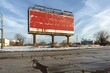 © Alena - A bright red billboard stands tall on the side of a road, awaiting attention