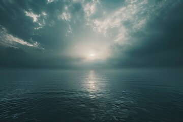 A calm large body of water under a cloudy sky