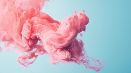 Wall Mural - abstract pink smoke swirling in blue liquid.