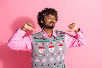 Poster - Portrait of nice young man point fingers self wear new year xmas vest isolated on pink color background