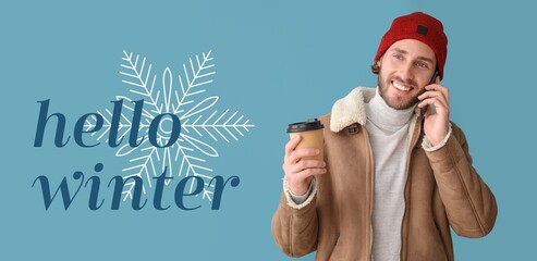 Sticker - Handsome man with coffee talking by mobile phone on blue background. Hello, winter