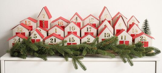 Poster - Advent calendar with Christmas branches on drawers in room