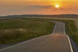 © imageBROKER - Winding country road at sunset, in midsummer, Marktheidenfeld, Main Spessart, Bavaria, Germany, Europe