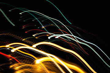 Wall Mural - the image is a series of colorful streaks that appear to be moving in a line. the streaks are bright