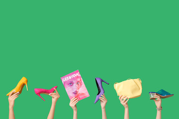 Poster - Female hands with magazine, stylish bag and different high heels on green background