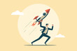 © Alya Hasna Fatimah - A strong businessman stands running while carrying a rocket