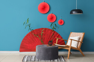 Canvas Print - Interior of living room with armchair, ottoman and decor for Japanese New Year celebration