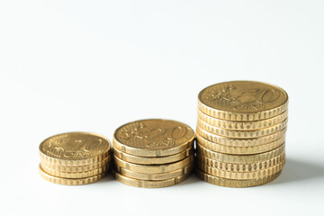 Wall Mural - Stacked euro coins on white background, closeup