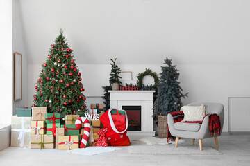 Sticker - Interior of light living room with fireplace, Santa bag and Christmas trees