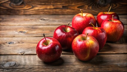 Fresh red apples sitting on a rustic wooden table, apples, wooden table, organic, natural, healthy, fruits, harvest, farm