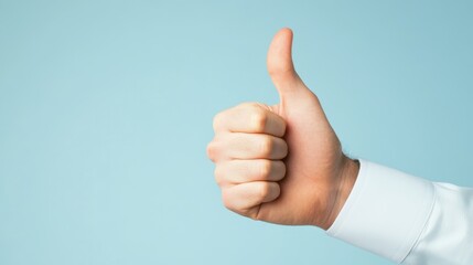 Image of a confident businessman giving a thumbs up, exuding positivity and success against a sleek, clean background.