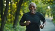 © Johannes - Smiling elderly black man jogging in green park outside in the morning, promoting an active lifestyle and engagement in sports for senior people, AI generated image