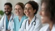 © ImagePulse - Doctors and nurses from different races participating in a trust-building workshop, promoting team unity, diverse healthcare, team building