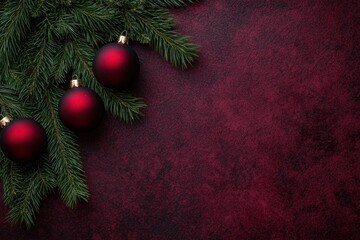 Festive Christmas background with red baubles green fir branches