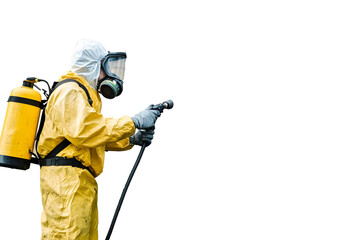 Wall Mural - Worker equipped with safety gear and breathing mask is removing spray paint from a brick wall using an efficient water jet cleaning method