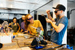 © GALDRIC - Glassblower Demonstrates Crystal Making to Students in Workshop
