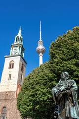 The Marienkirche and the famous TV Tower at the Alexanderplatz in Berlin