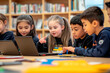 © Marc Elias - Group of students collaborating with laptops in a creative classroom