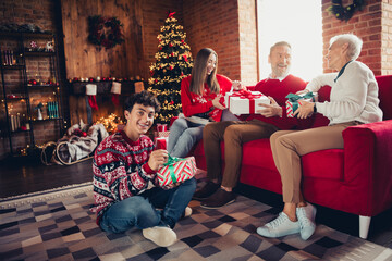 Poster - Full size photo of big full family hold giftbox sit sofa gather celebrate christmas x-mas home apartment indoors