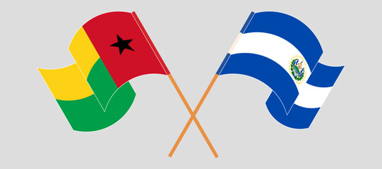 Wall Mural - Crossed and waving flags of Guinea-Bissau and Republic of El Salvador. Vector illustration