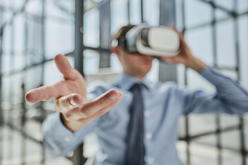 businessman in virtual reality headset in the office