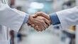 © Christian - handshake collaboration in pharma healthcare sector, deal, money maker, 16:9