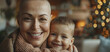 © Photolife   - portrait of a joyful Caucasian preschool-age son hugging his bald mother with cancer. victory over the disease while at home against the backdrop of a decorated Christmas tree