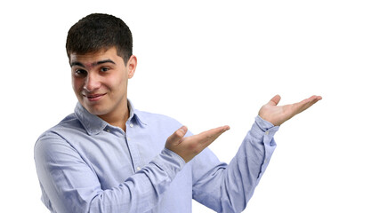 Wall Mural - A man, close-up, on a white background, points to the side