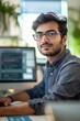 © Photocreo Bednarek - Focused software engineer coding in a tech office