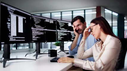 Fototapete - Unhappy Sad Developer Programmers In Stress Coding Software