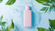 © Jirawatfoto - Delicate pastel cosmetic bottle surrounded by water and green leaves, creating refreshing and serene atmosphere. Perfect for beauty and skincare themes